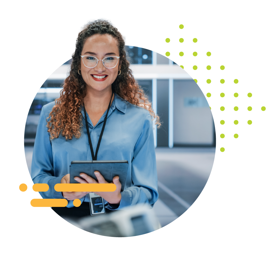 smiling IT associate working confidently